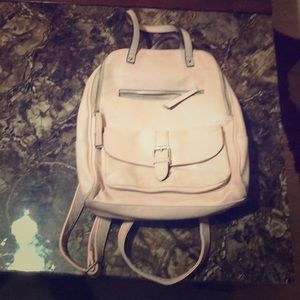A mini pink backpack